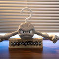 Cartoon rock character hook hanger scene view