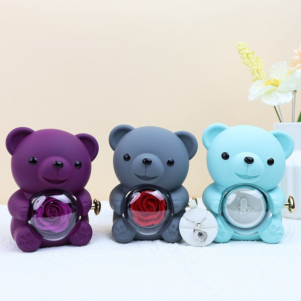 Hug bear preserved rose jewelry box shown in purple, gray, and aqua