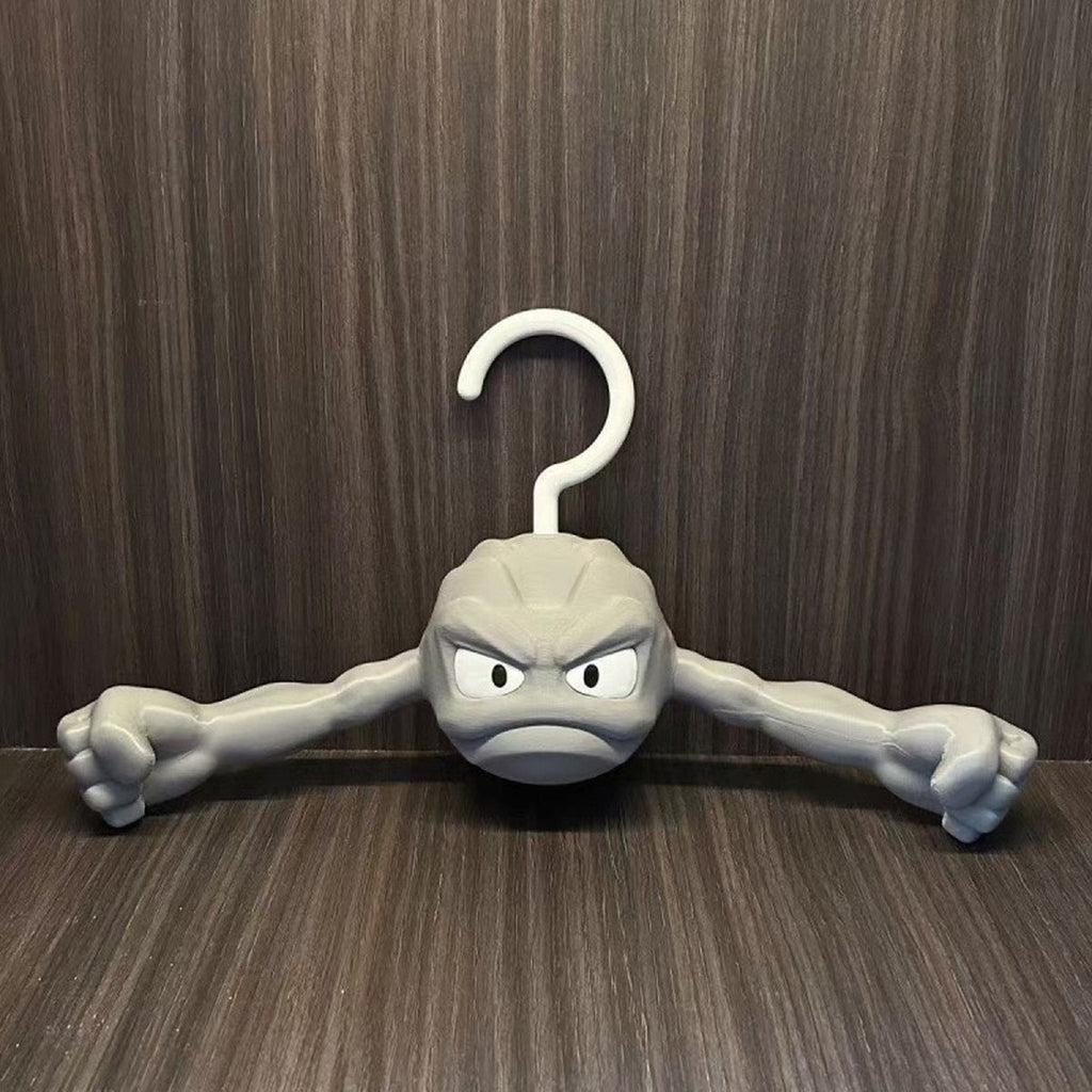 Cartoon rock character hook hanger on wood background
