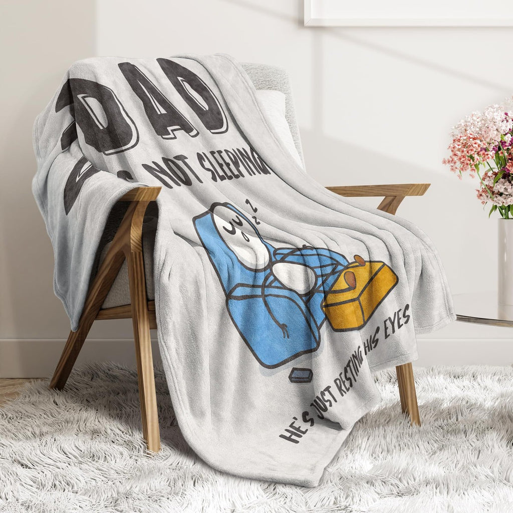 Gray Dad resting eyes blanket on chair