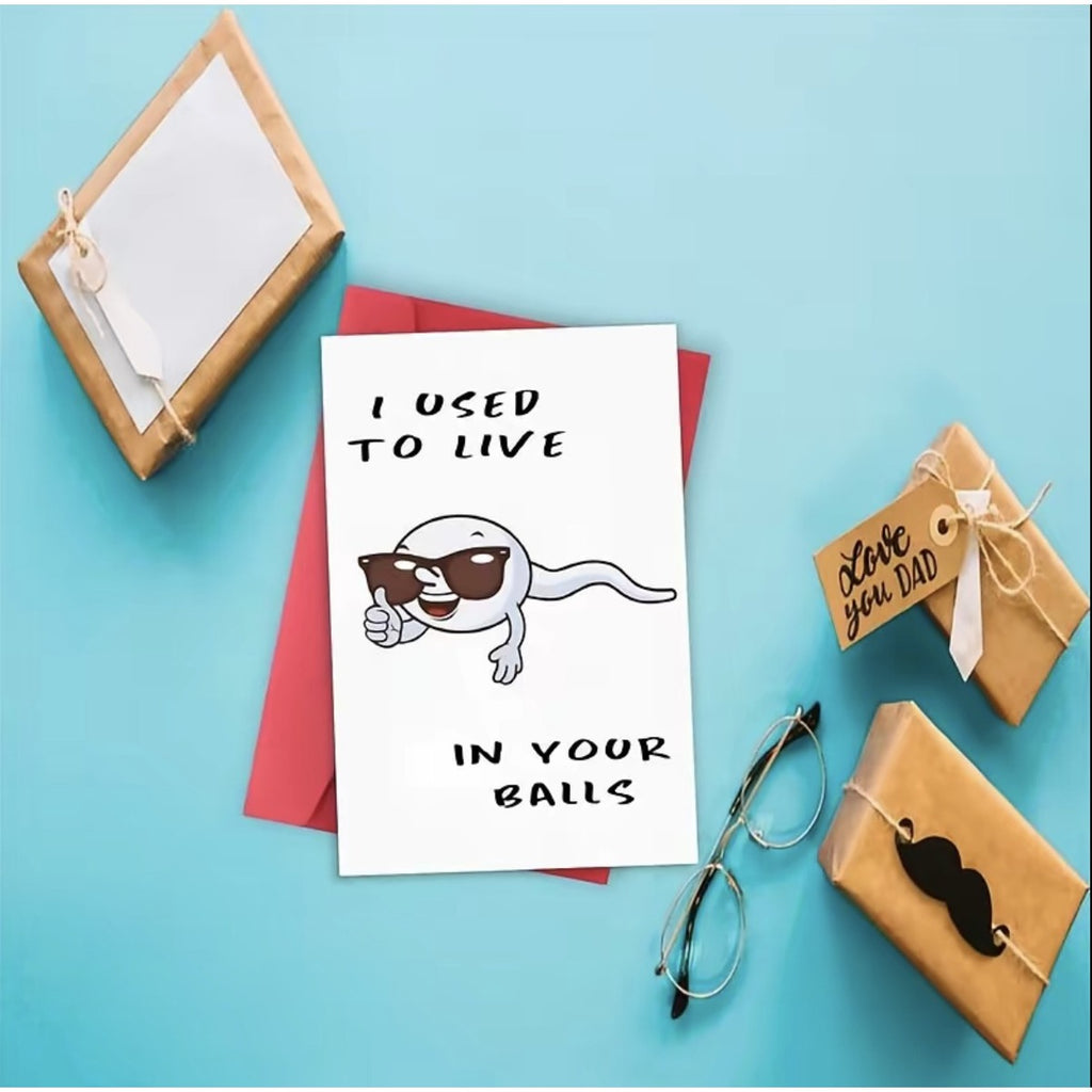 Funny Father's Day card displayed with gift items