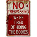 Funny No Trespassing Metal Sign (8" x 12") - "Tired of Hiding Bodies"